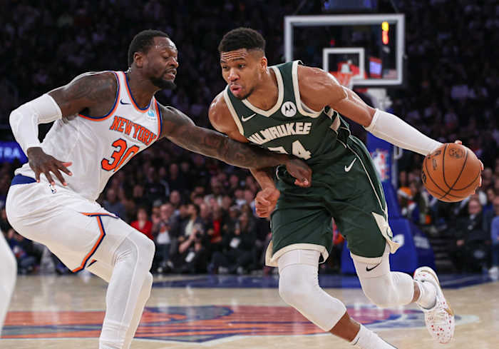 Milwaukee Bucks forward Giannis Antetokounmpo (34) dribbles against New York Knicks forward Julius Randle (30)